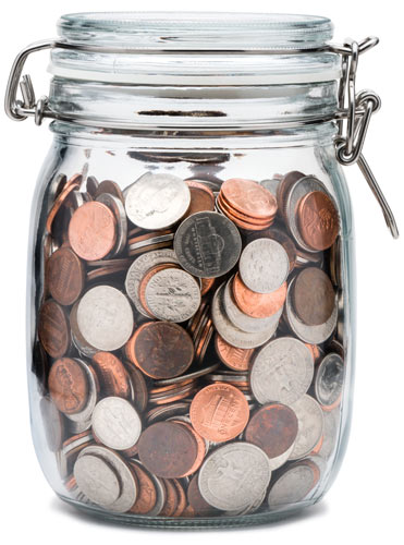 Canning jar full of coins for donations